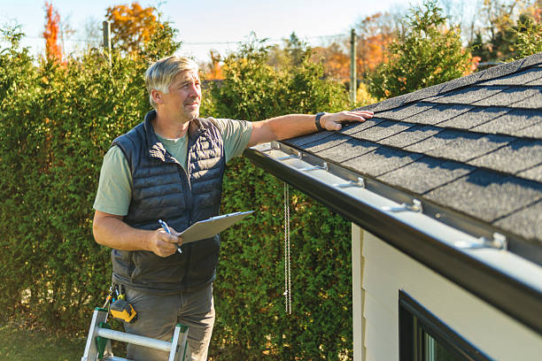 Professional Flat Roof Repair technician working in Whiting, WI